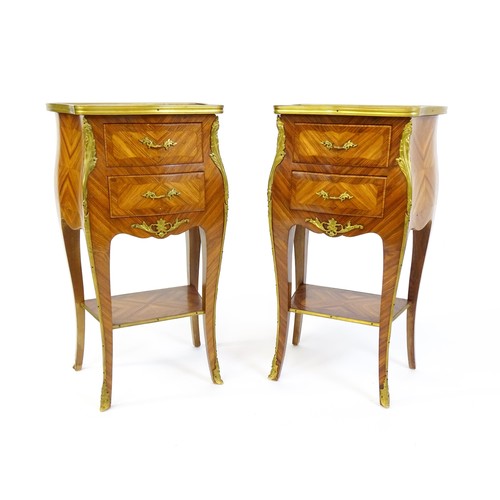 1646 - A pair of early / mid 20thC kingwood cabinets with gilt metal banding and floral mounts, each cabine... 