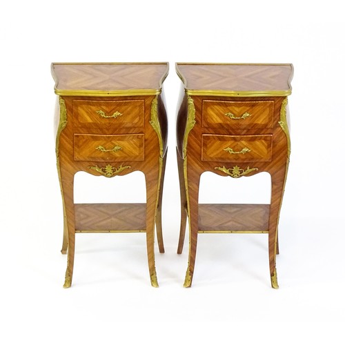 1646 - A pair of early / mid 20thC kingwood cabinets with gilt metal banding and floral mounts, each cabine... 