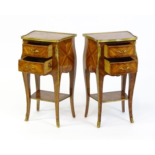 1646 - A pair of early / mid 20thC kingwood cabinets with gilt metal banding and floral mounts, each cabine... 