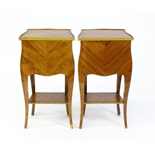 1646 - A pair of early / mid 20thC kingwood cabinets with gilt metal banding and floral mounts, each cabine... 