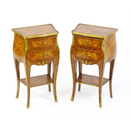 1646 - A pair of early / mid 20thC kingwood cabinets with gilt metal banding and floral mounts, each cabine... 