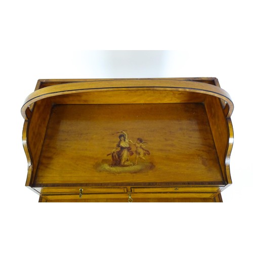 1658 - A 19thC satinwood Bonheur du jour, the removeable top having an arched carrying handle and three sma... 