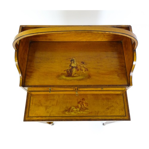 1658 - A 19thC satinwood Bonheur du jour, the removeable top having an arched carrying handle and three sma... 