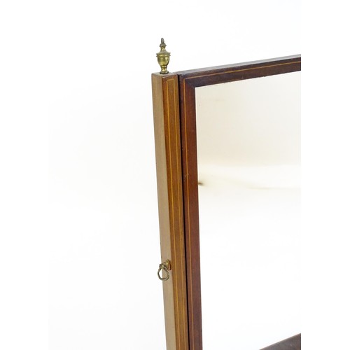 1663 - A late 19thC walnut toilet mirror / dressing mirror with satinwood inlay and surmounted by brass fin... 