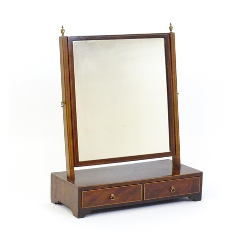 1663 - A late 19thC walnut toilet mirror / dressing mirror with satinwood inlay and surmounted by brass fin... 