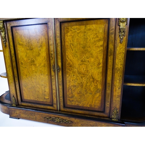 1668 - A 19thC burr walnut credenza, with an ebonised finish to the top edge and to the stepped base. The b... 