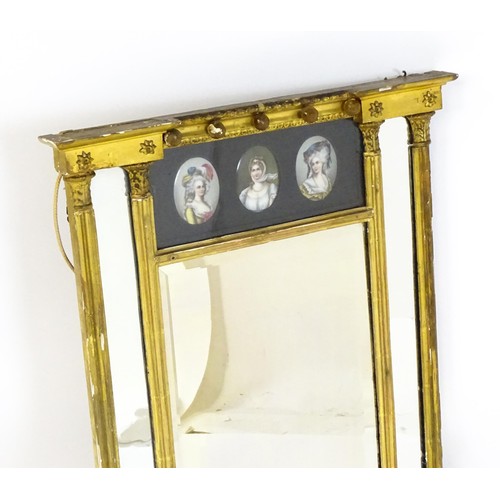 1723 - A Regency period pier mirror with a moulded cornice above applied bauble decoration and three painte... 