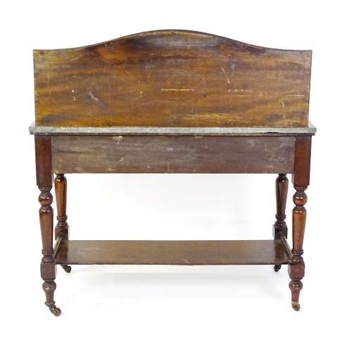 1727 - A late 19thC / early 20thC washstand, with a marble splashback and matching marble top above two sho... 