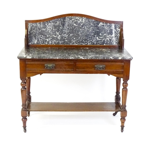 1727 - A late 19thC / early 20thC washstand, with a marble splashback and matching marble top above two sho... 