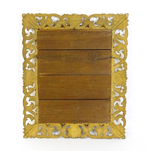 1729 - A 19thC water gilded carved wooden mirror with original wide bevelled glass and profuse carved pierc... 