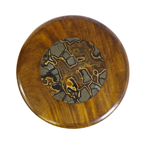 1751 - A Victorian mahogany and septarian nodule occasional table, the circular top raised on a canted pede... 