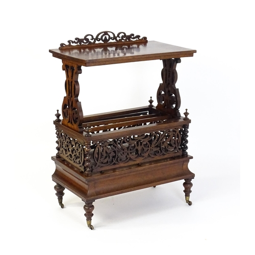 1527 - An early / mid 19thC rosewood Canterbury with a rectangular figured top above lyre shaped supports a... 