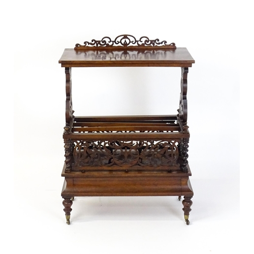 1527 - An early / mid 19thC rosewood Canterbury with a rectangular figured top above lyre shaped supports a... 