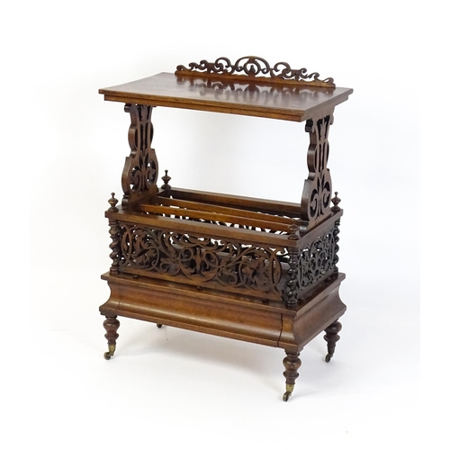 1527 - An early / mid 19thC rosewood Canterbury with a rectangular figured top above lyre shaped supports a... 