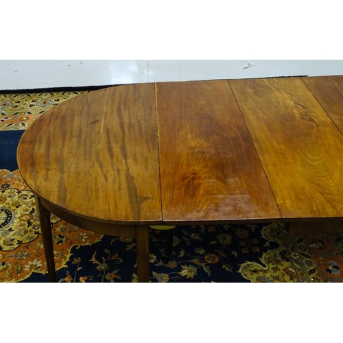 1531 - A 19thC mahogany D - end dining table comprised of two demi lune tables and a drop flap table raised... 