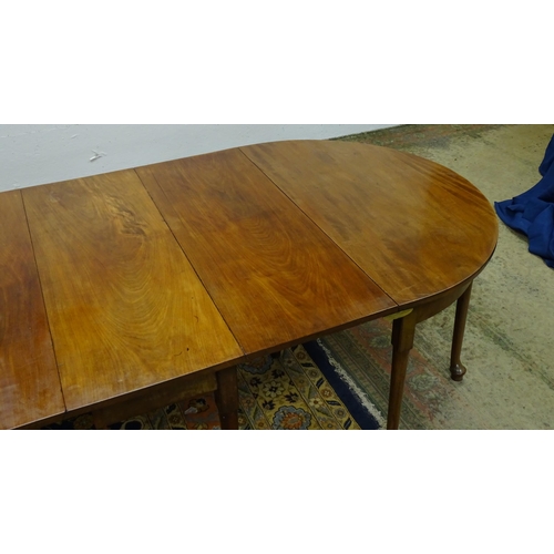 1531 - A 19thC mahogany D - end dining table comprised of two demi lune tables and a drop flap table raised... 