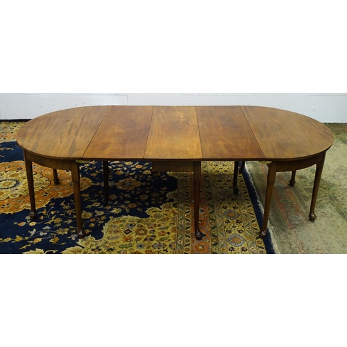 1531 - A 19thC mahogany D - end dining table comprised of two demi lune tables and a drop flap table raised... 