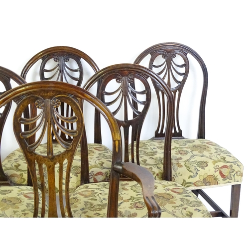 1534 - A set of six (5+1) 19thC Hepplewhite dining chairs with carved and fanned anthemion back splats swep... 