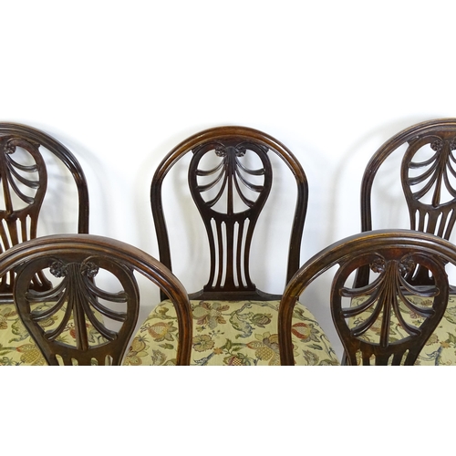 1534 - A set of six (5+1) 19thC Hepplewhite dining chairs with carved and fanned anthemion back splats swep... 