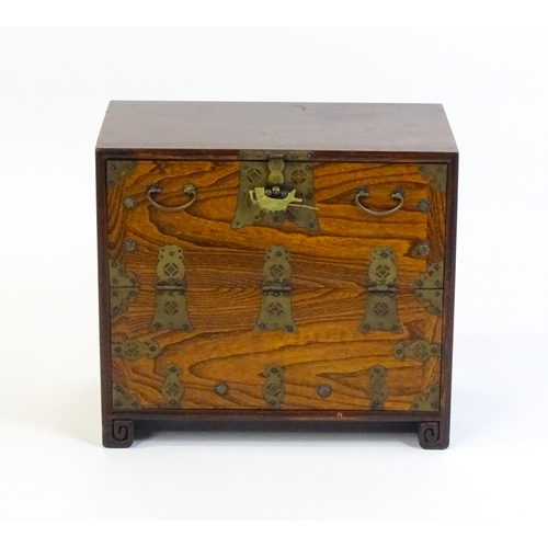 1549 - A late 20thC Oriental style cabinet with pierced strapwork decoration and raised on scrolled feet. 2... 