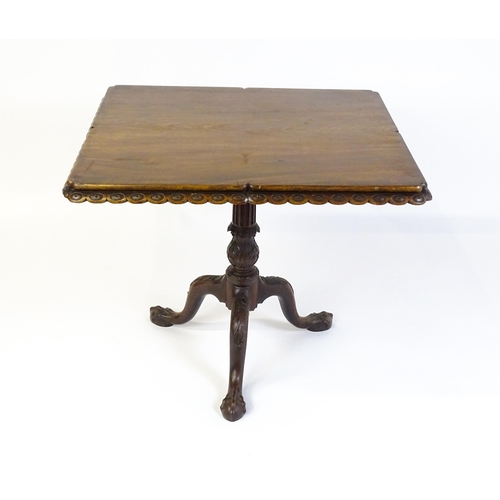 1568 - A mid / late 18thC mahogany tilt top table with an unusual moulded surround, re-entrant corners and ... 