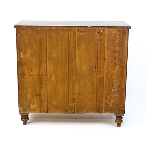 1585 - A Victorian mahogany chest of drawers with two short over three long drawers with turned wooden hand... 