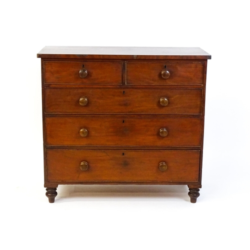 1585 - A Victorian mahogany chest of drawers with two short over three long drawers with turned wooden hand... 