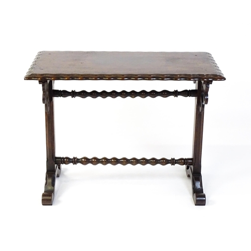 1592 - A 19thC mahogany side table with a double moulded rectangular top above two chamfered platform suppo... 