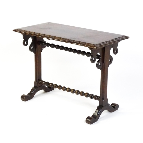 1592 - A 19thC mahogany side table with a double moulded rectangular top above two chamfered platform suppo... 