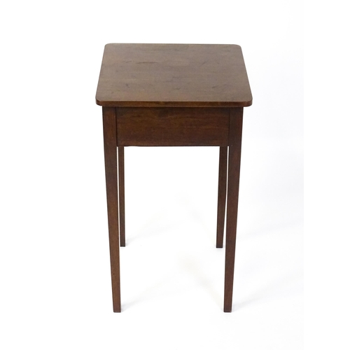 1593 - A late Georgian mahogany side table with a small frieze drawer, bone escutcheon, brass knob handles ... 