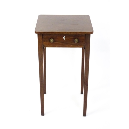 1593 - A late Georgian mahogany side table with a small frieze drawer, bone escutcheon, brass knob handles ... 