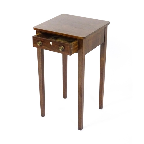 1593 - A late Georgian mahogany side table with a small frieze drawer, bone escutcheon, brass knob handles ... 