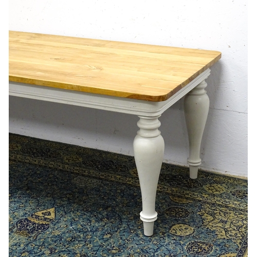 1615 - A late 20thC dining / refectory table with a planked top above a painted base and four baluster turn... 