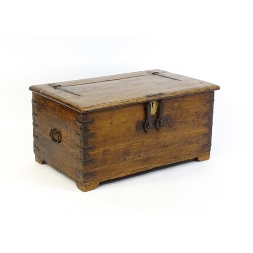 1620 - A 19thC Anglo-Indian marriage chest with large wrought iron hinges and carrying handles, alongside w... 