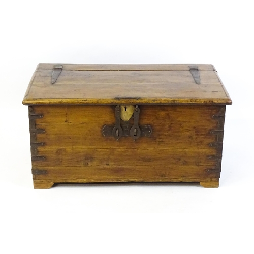 1620 - A 19thC Anglo-Indian marriage chest with large wrought iron hinges and carrying handles, alongside w... 