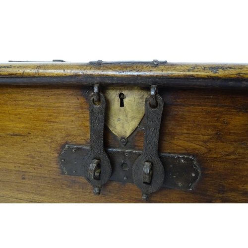 1620 - A 19thC Anglo-Indian marriage chest with large wrought iron hinges and carrying handles, alongside w... 