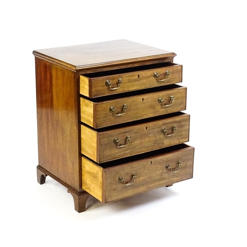 1627 - A 19thC mahogany chest of drawers with a moulded top above four graduated drawers with brass swan ne... 