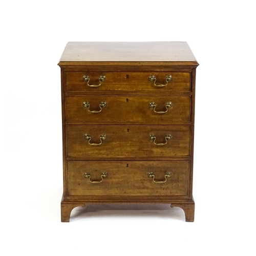 1627 - A 19thC mahogany chest of drawers with a moulded top above four graduated drawers with brass swan ne... 