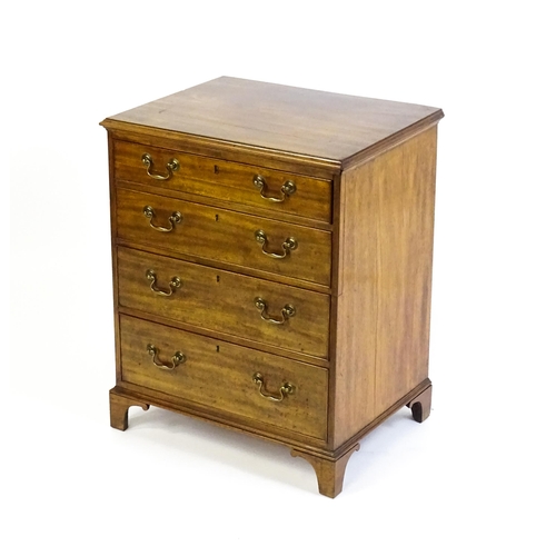 1627 - A 19thC mahogany chest of drawers with a moulded top above four graduated drawers with brass swan ne... 