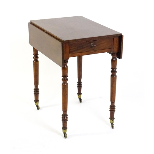 1635 - A mid / late 19thC mahogany Pembroke table with drop flaps to either side,  a single small frieze dr... 