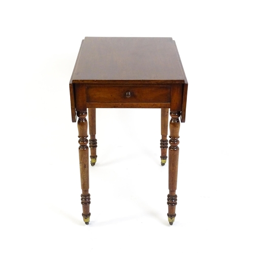 1635 - A mid / late 19thC mahogany Pembroke table with drop flaps to either side,  a single small frieze dr... 