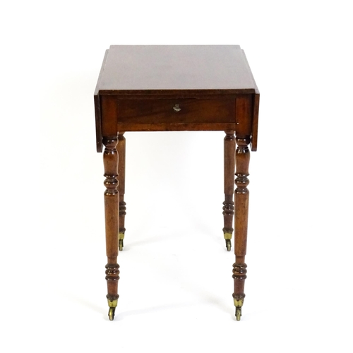 1635 - A mid / late 19thC mahogany Pembroke table with drop flaps to either side,  a single small frieze dr... 