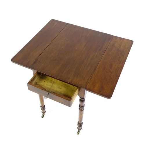 1635 - A mid / late 19thC mahogany Pembroke table with drop flaps to either side,  a single small frieze dr... 