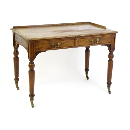 1636 - A 19thC walnut Gothic desk by Hindley & Sons of Oxford St, London with a shaped upstand above two sh... 