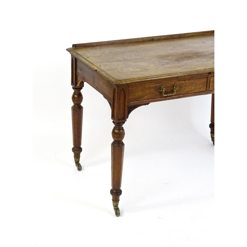 1636 - A 19thC walnut Gothic desk by Hindley & Sons of Oxford St, London with a shaped upstand above two sh... 