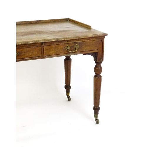 1636 - A 19thC walnut Gothic desk by Hindley & Sons of Oxford St, London with a shaped upstand above two sh... 