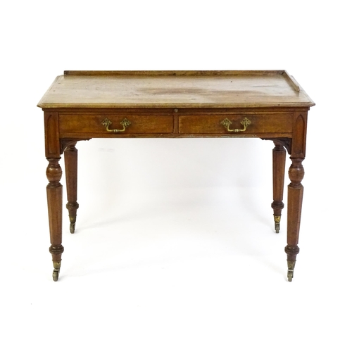 1636 - A 19thC walnut Gothic desk by Hindley & Sons of Oxford St, London with a shaped upstand above two sh... 