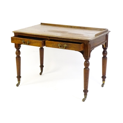 1636 - A 19thC walnut Gothic desk by Hindley & Sons of Oxford St, London with a shaped upstand above two sh... 