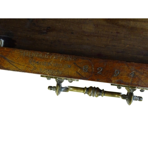 1636 - A 19thC walnut Gothic desk by Hindley & Sons of Oxford St, London with a shaped upstand above two sh... 