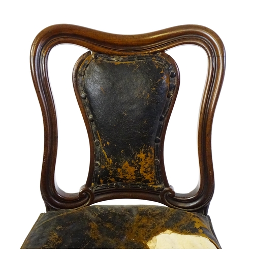 1637 - A 19thC mahogany side chair with a moulded and shaped backrest, vase shaped back splat and a leather... 